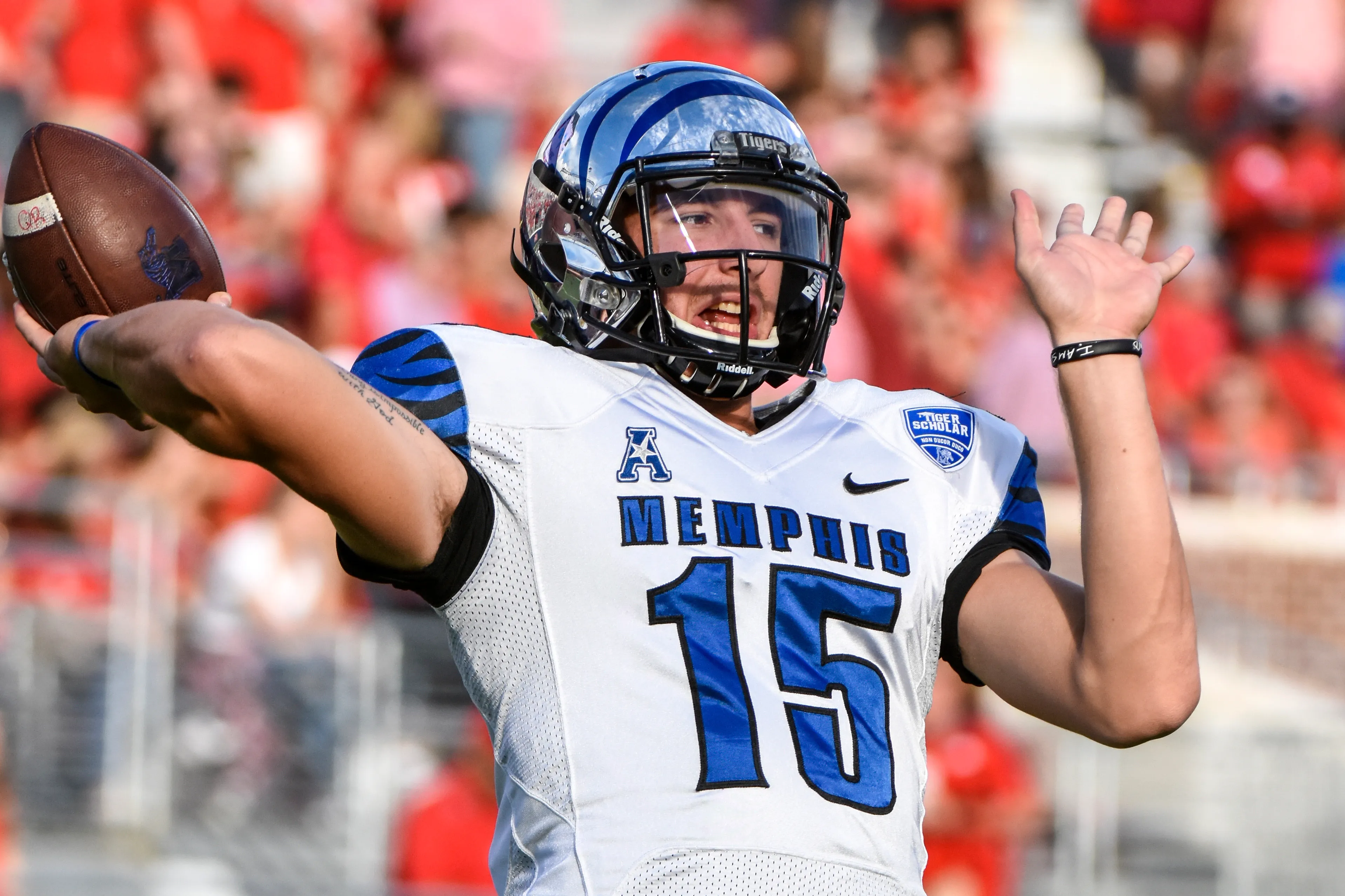 Jason Stewart throwing as a Memphis quarterback